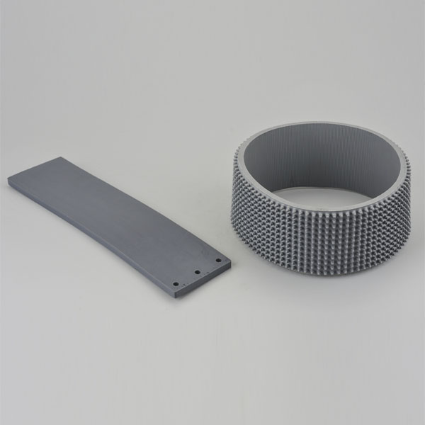 Friction toothed belt + pressing plate