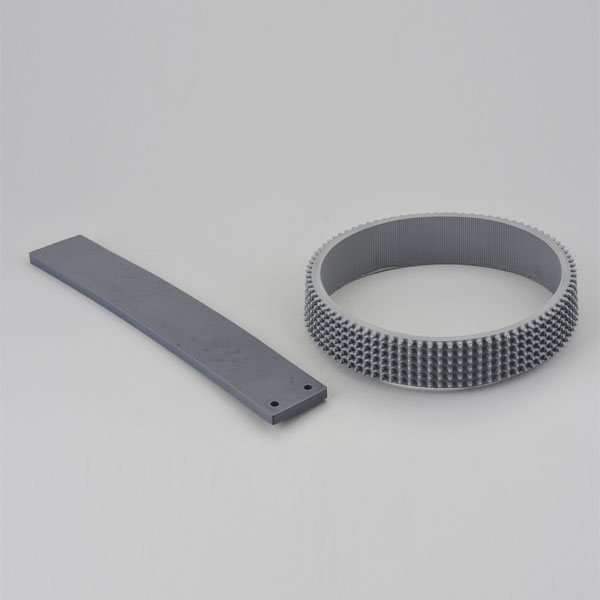 Friction toothed belt + pressing plate